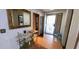 Bright foyer features wood floors and views of the front door and a glimpse into another bedroom at 200 Fox Hall Court Ct, South Fulton, GA 30349