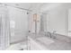 Bright bathroom with subway tile and a marble vanity top at 2505 Midway Rd, Decatur, GA 30030