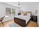 Bright bedroom with hardwood floors, a ceiling fan, and two dressers at 2505 Midway Rd, Decatur, GA 30030