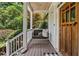 Inviting front porch with a swing, offering a cozy and relaxing outdoor space at 2505 Midway Rd, Decatur, GA 30030