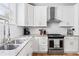 Well-appointed kitchen details featuring stainless steel appliances, granite countertops, and ample cabinet space at 2505 Midway Rd, Decatur, GA 30030