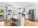 Modern kitchen with stainless steel appliances, granite countertops, and a center island at 2505 Midway Rd, Decatur, GA 30030