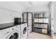 Laundry room features modern washer and dryer and ample storage space at 2505 Midway Rd, Decatur, GA 30030