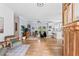 Open-concept living space featuring hardwood floors and seamless flow into the kitchen at 2505 Midway Rd, Decatur, GA 30030