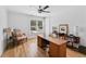 Bright office with a large desk, ample shelving, and natural light at 2505 Midway Rd, Decatur, GA 30030