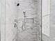 Modern tiled shower with a rainfall showerhead and built-in niche at 2505 Midway Rd, Decatur, GA 30030