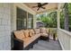 Comfortable side porch with cushioned seating, perfect for enjoying the outdoors at 2505 Midway Rd, Decatur, GA 30030