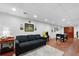 Finished basement featuring a comfy couch, foosball table, and classic arcade game at 4250 Green Ridge Dr, Marietta, GA 30062