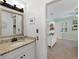 Bathroom featuring granite countertops, white cabinetry, and access to the bedroom at 4250 Green Ridge Dr, Marietta, GA 30062