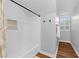 Bright bathroom features a tiled shower with niche and a window that filters in plenty of natural light at 4250 Green Ridge Dr, Marietta, GA 30062