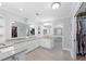 Bright primary bathroom featuring dual sinks, granite counters, walk-in closet, and an adjoining bedroom at 4250 Green Ridge Dr, Marietta, GA 30062
