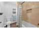 Neutral bathroom with tiled shower, shuttered window, and wood-look floors at 4250 Green Ridge Dr, Marietta, GA 30062