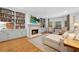 Cozy living room with a fireplace, built-in bookshelves, and comfortable seating area at 4250 Green Ridge Dr, Marietta, GA 30062