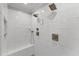 Luxurious shower with white tiled walls, dual shower heads, and a built-in seat at 4250 Green Ridge Dr, Marietta, GA 30062