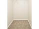 Walk-in closet with carpet flooring and rod for hanging clothes at 6481 Alford Way, Lithonia, GA 30058