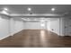 Finished basement with recessed lighting and a large open area, perfect for entertaining and relaxing at 7110 Northgreen Dr, Atlanta, GA 30328