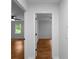 Hallway that shows the hardwood flooring and multiple rooms at 7110 Northgreen Dr, Atlanta, GA 30328