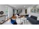Comfortable living room showcasing hardwood floors, stylish seating arrangement, and modern interior design at 7110 Northgreen Dr, Atlanta, GA 30328