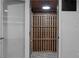 Custom wine cellar with wooden racks and climate control, great for storing and showcasing wine collection at 7110 Northgreen Dr, Atlanta, GA 30328
