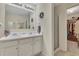Bathroom featuring double sinks, shower, and closet, provides ample storage at 2336 Heritage Park Nw Cir # 11, Kennesaw, GA 30144