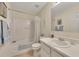 Well-lit bathroom featuring a tub with shower, toilet, vanity sink, and a mirror at 2336 Heritage Park Nw Cir # 11, Kennesaw, GA 30144