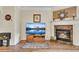 Stylish living room fireplace with a wooden mantel and decorative accents at 2336 Heritage Park Nw Cir # 11, Kennesaw, GA 30144