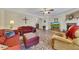 Comfortable living room featuring a fireplace, ceiling fan, and hardwood floors at 2336 Heritage Park Nw Cir # 11, Kennesaw, GA 30144