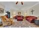 Cozy living room with plush furniture, ceiling fan, and large area rug at 2336 Heritage Park Nw Cir # 11, Kennesaw, GA 30144