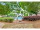 Neighborhood pool with fencing, pool house, and lounge chairs, framed by mature trees at 2336 Heritage Park Nw Cir # 11, Kennesaw, GA 30144