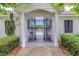 Gated entrance to community pool area featuring stately columns and mature landscaping at 2336 Heritage Park Nw Cir # 11, Kennesaw, GA 30144