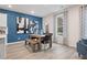 Bright dining room featuring a wooden table, ample seating, and lots of natural light at 33 Cedar Dr, Fairburn, GA 30213