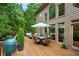 Spacious back deck with dining area, grill, and natural light at 130 Silver Mist Cir, Alpharetta, GA 30022
