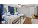 Bedroom with hardwood floors, comfortable twin beds, and natural light with blackout curtains at 130 Silver Mist Cir, Alpharetta, GA 30022