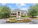 Elegant clubhouse featuring a fountain, manicured landscaping and architectural design at 130 Silver Mist Cir, Alpharetta, GA 30022
