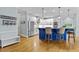 Open concept kitchen and bar featuring modern stainless appliances at 130 Silver Mist Cir, Alpharetta, GA 30022