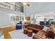 Spacious Gathering room leads into open kitchen with stainless appliances and island at 130 Silver Mist Cir, Alpharetta, GA 30022