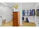 Walk-in closet featuring an organization system, carpeted floors, and natural light at 130 Silver Mist Cir, Alpharetta, GA 30022