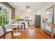 Bright and airy eat-in kitchen with modern appliances, hardwood floors, and stylish decor at 615 Sycamore Dr, Decatur, GA 30030