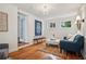Cozy sitting room with hardwood floors and views to the outside at 615 Sycamore Dr, Decatur, GA 30030