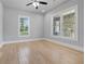 Bright bedroom with hardwood floors and large windows offering plenty of natural light at 1363 Jonesboro Se Rd, Atlanta, GA 30315