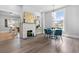 Elegant dining room featuring a stylish fireplace, contemporary lighting, and inviting seating at 1363 Jonesboro Se Rd, Atlanta, GA 30315