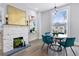 Charming dining room with hardwood floors, modern lighting, and comfortable seating for four at 1363 Jonesboro Se Rd, Atlanta, GA 30315