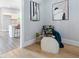 Relaxing living area with wood floors next to the open kitchen at 1363 Jonesboro Se Rd, Atlanta, GA 30315