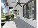 Inviting porch with stylish black and white trim, ceiling fan, and ample natural light at 1363 Jonesboro Se Rd, Atlanta, GA 30315
