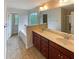Bright primary bathroom featuring a double sink vanity, soaking tub, and separate shower at 3695 Santa Rosa Way, Douglasville, GA 30135