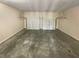 A two car garage with automatic overhead door openers and a sealed concrete floor at 3695 Santa Rosa Way, Douglasville, GA 30135