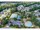 An aerial view showcases community pool and tennis courts at 615 Rosedown Way, Alpharetta, GA 30022