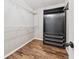 Walk-in closet with custom storage solutions, including wire shelves and tiered basket drawers at 615 Rosedown Way, Alpharetta, GA 30022