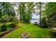 Enjoy the outdoors in this peaceful backyard with a gazebo near the lake at 9018 Lakeview Pkwy, Villa Rica, GA 30180
