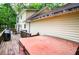 The home has a spacious backyard deck with views of lush greenery at 9018 Lakeview Pkwy, Villa Rica, GA 30180